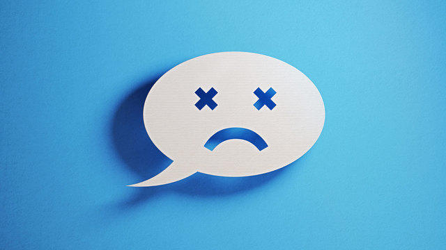 Frowning face in a speech bubble