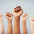 Fists raised in the air