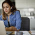 Woman taking LSAT exam at home